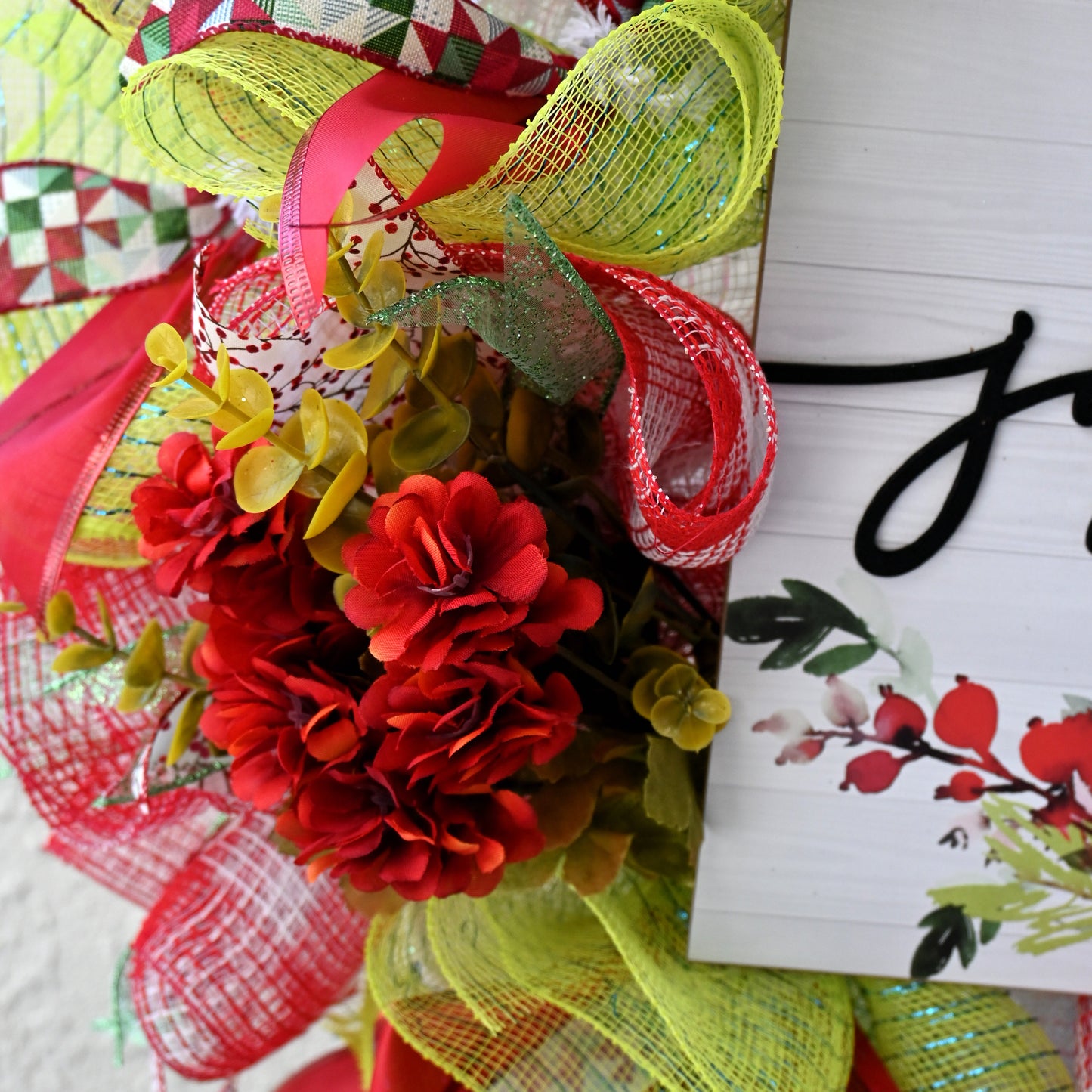 a close up of a wreath on a door