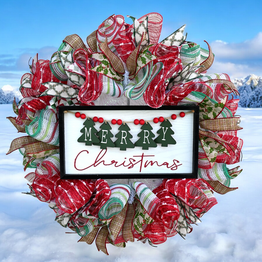 a christmas wreath with a merry christmas sign