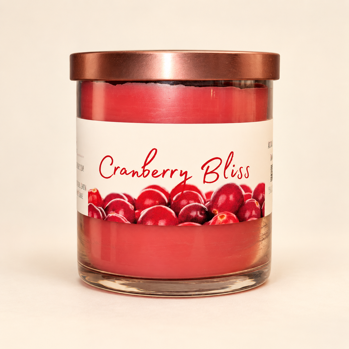 Cranberry Bliss candle by Lit Apothecary in a glass jar with copper lid and cranberry label
