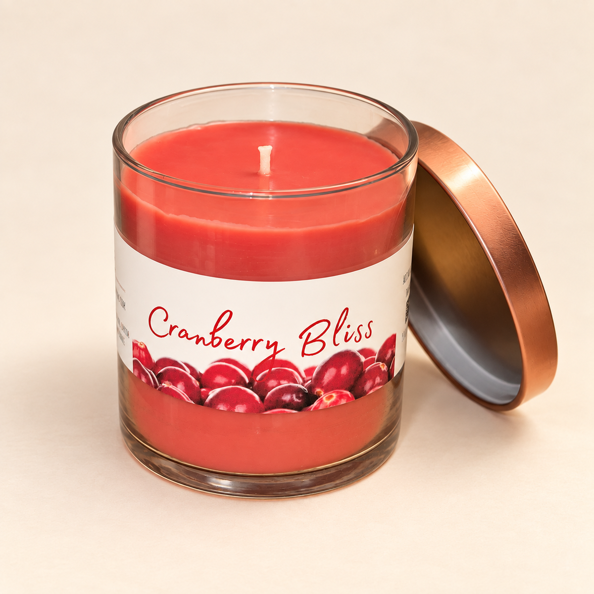 Angled view of the Cranberry Bliss candle showing the red wax surface and single wick