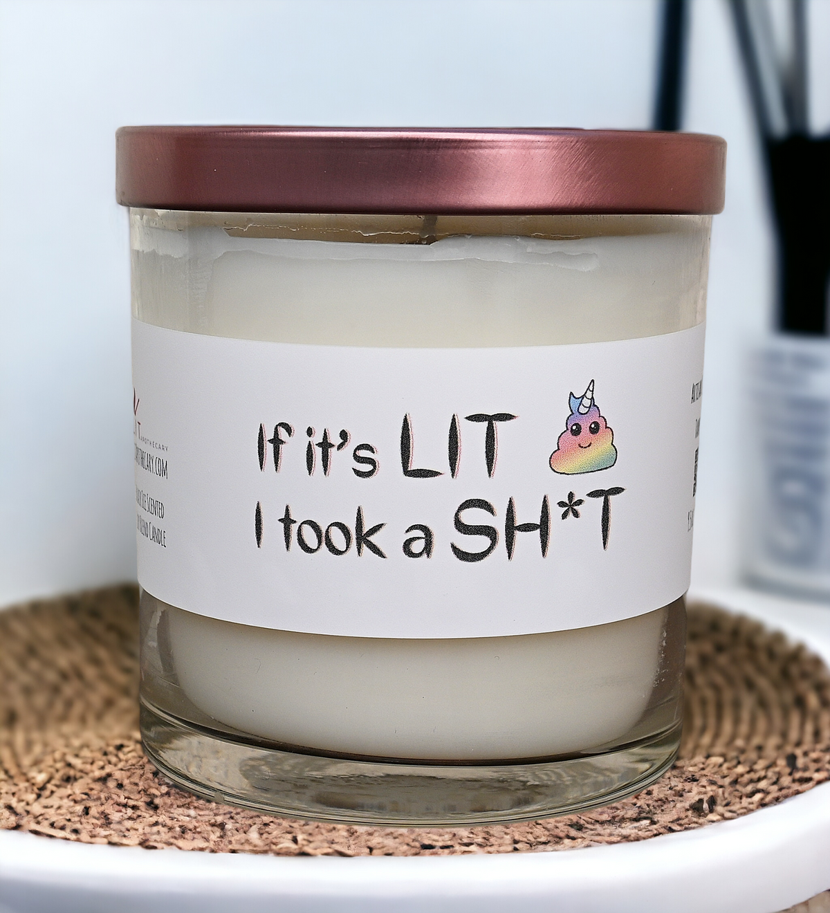 Closed If It's LIT I Took a SH*T bathroom candle in clear glass with rose gold lid and rainbow poop label