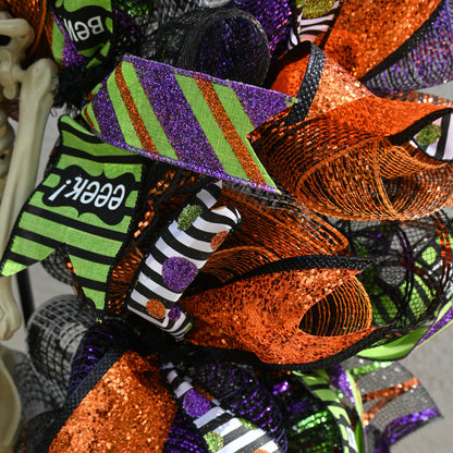 a close up of a halloween wreath