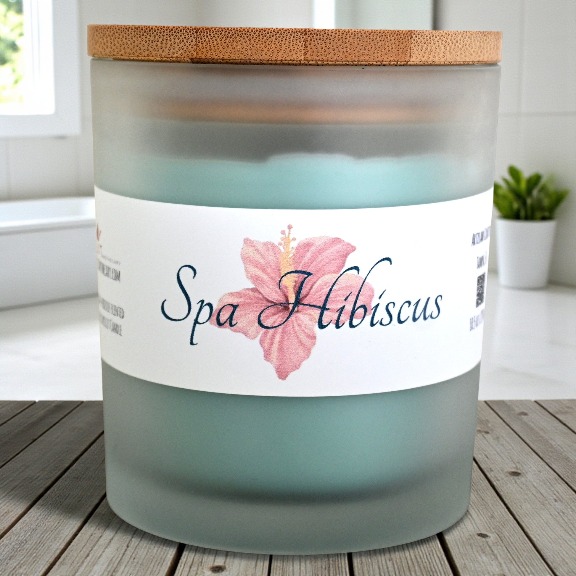 Spa Hibiscus Candle displayed in a chic frosted jar, showcasing the soothing agave hibiscus scent from Lit Apothecary.