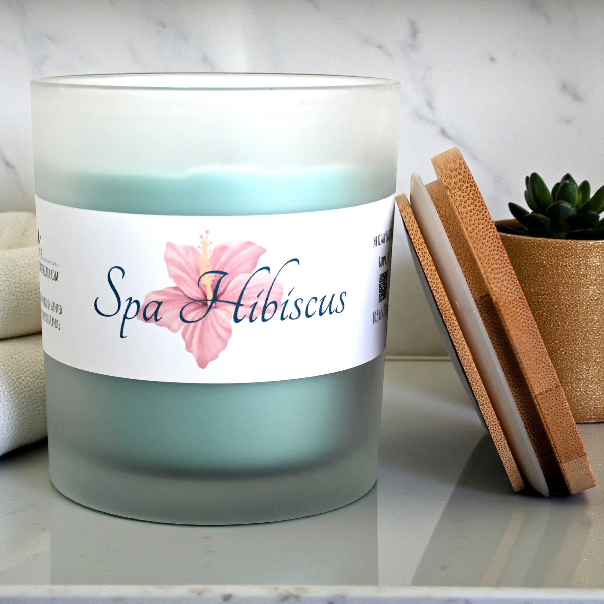Hand-poured Spa Hibiscus Candle by Lit Apothecary, perfect for relaxation with calming agave and hibiscus aroma.