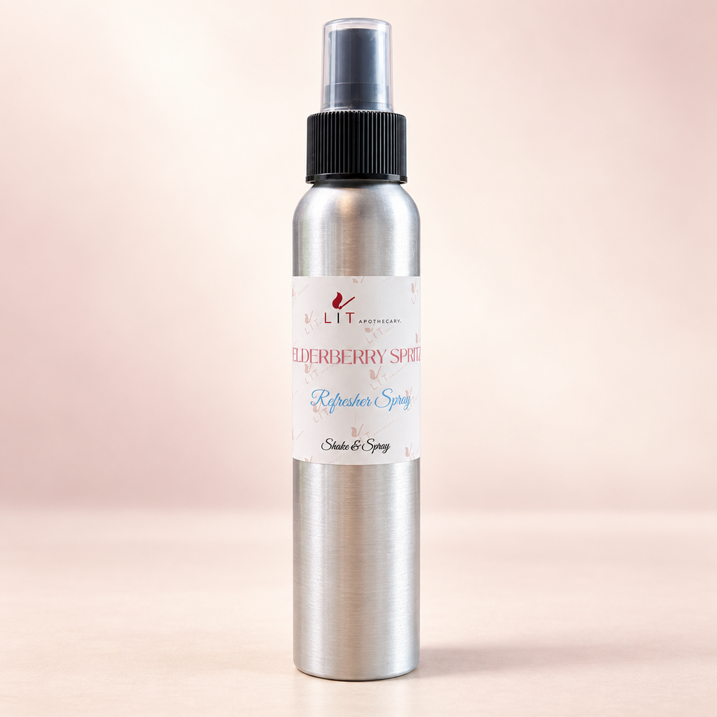 Elderberry Spritz room spray in a silver aluminum bottle with elderberries and a sparkling rosé drink