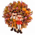 24 inch Harvest Scarecrow Couple Fall Wreath on white background