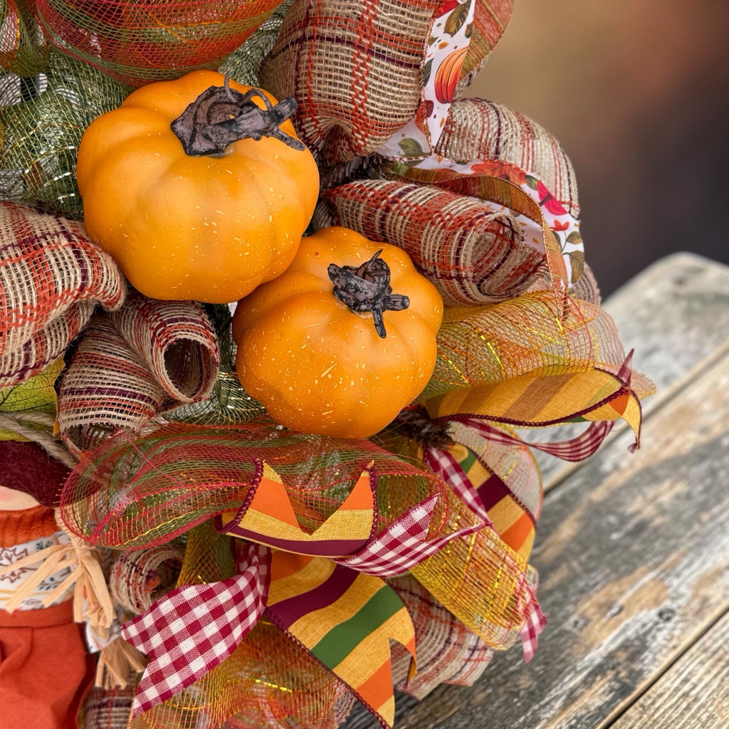 Harvest Scarecrow Couple Fall Wreath close-up of pumpkins and ribbon