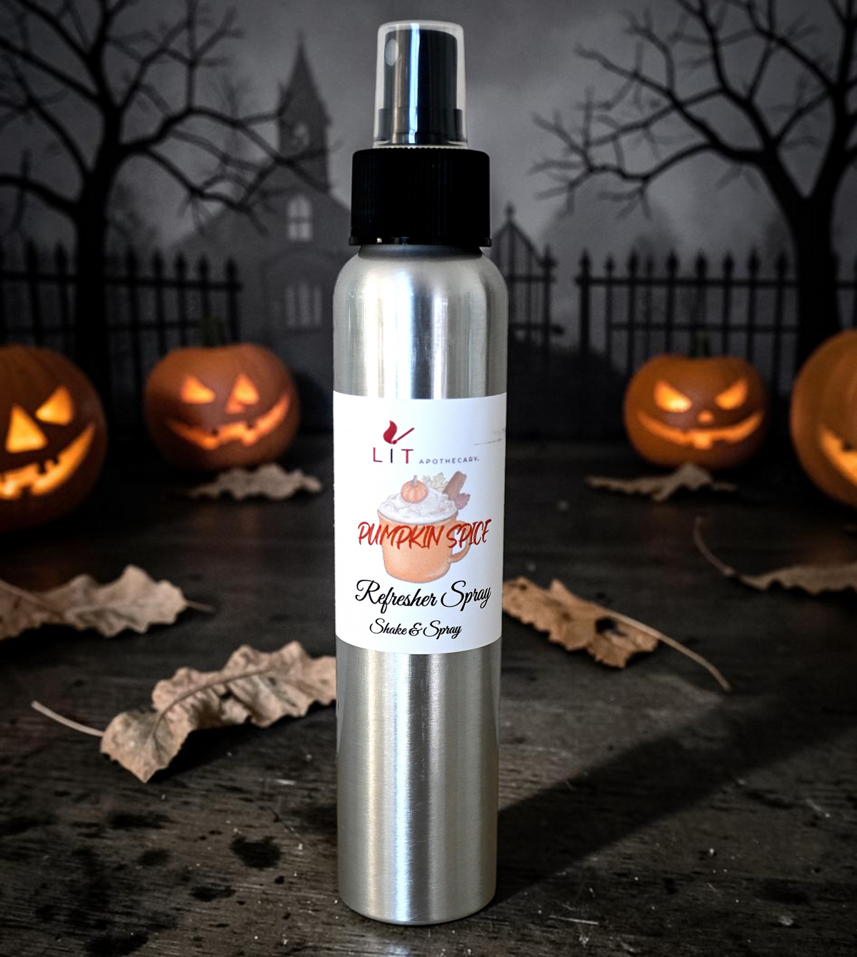 Lit Apothecary Pumpkin Spice room spray with glowing jack-o'-lanterns and a haunted house