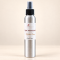 Teak Mahogany room spray in a silver aluminum bottle by Lit Apothecary
