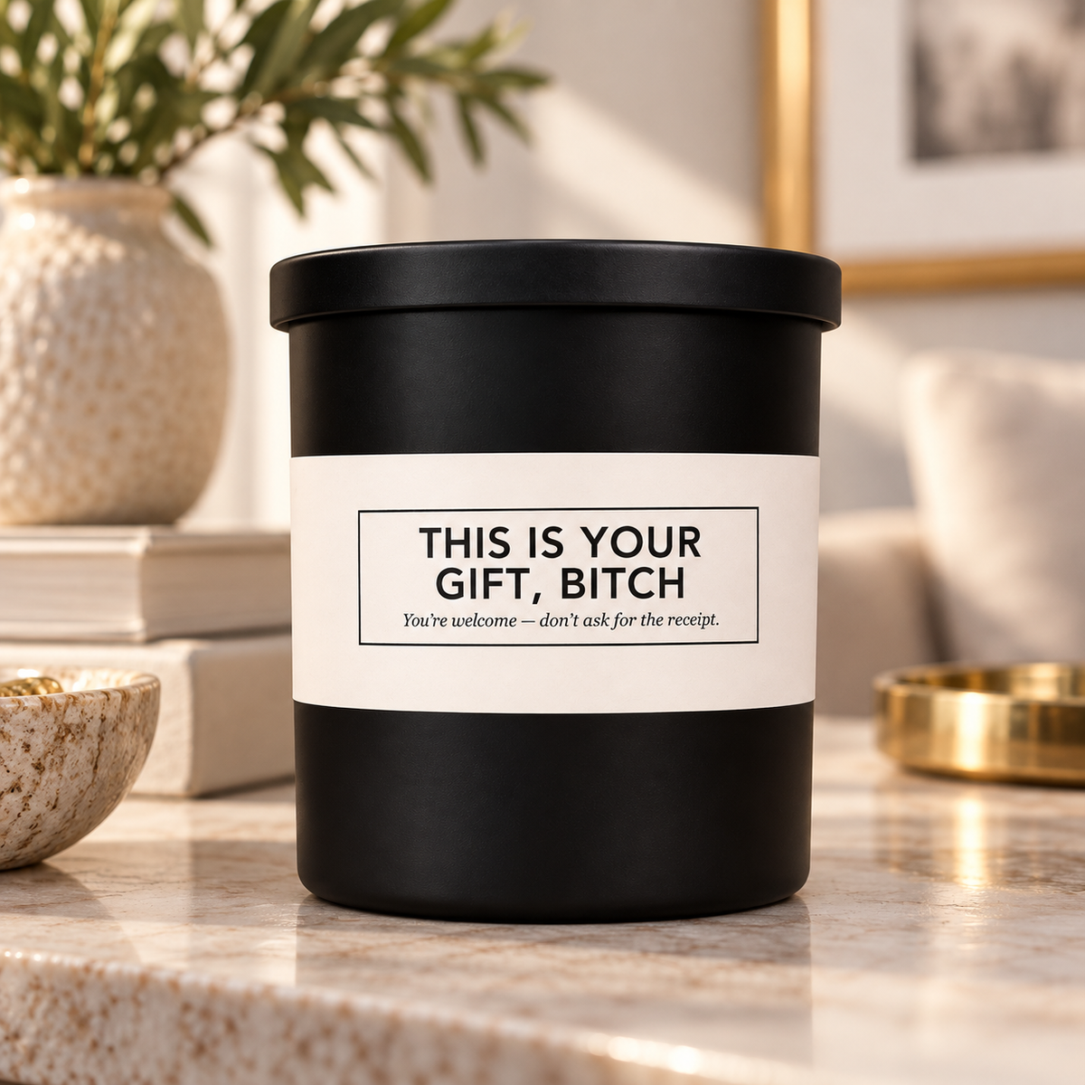 This Is Your Gift Bitch candle styled in a warm elegant home