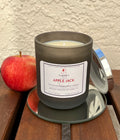 Apple Jack apple spice candle in a decorative jar with diamond-style metal lid for cozy fall home fragrance.