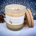 Open Christmas Cookie candle with sugar cookie, warm spice and light pine fragrance