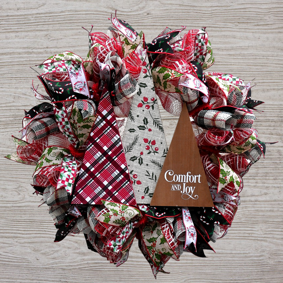 Comfort and Joy Christmas tree wreath with red, white and green holiday ribbons