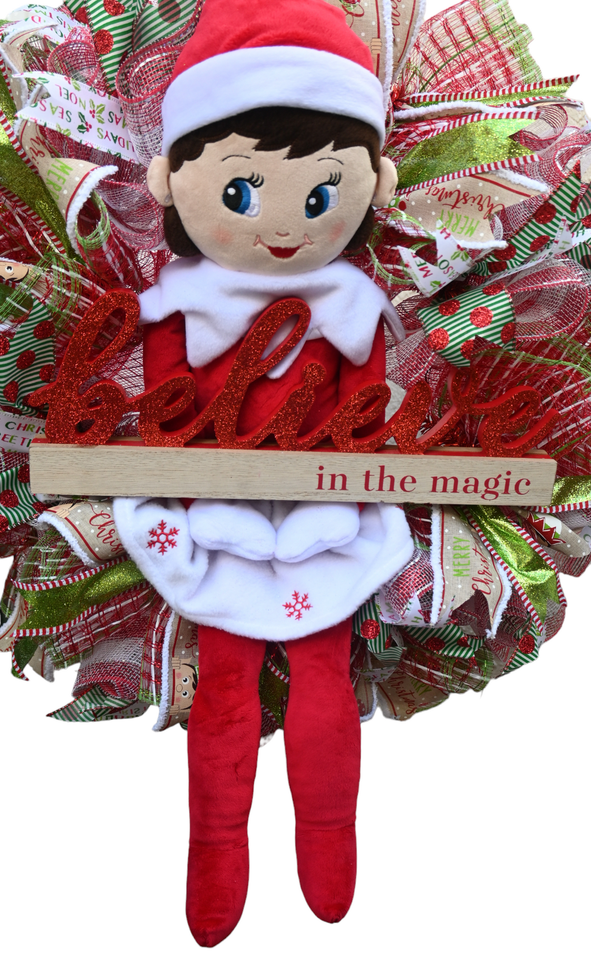 Close-up of the girl elf centerpiece featured on the Christmas wreath