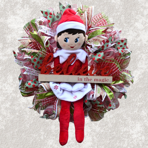 Believe in the Magic elf Christmas wreath with red, green and white holiday accents