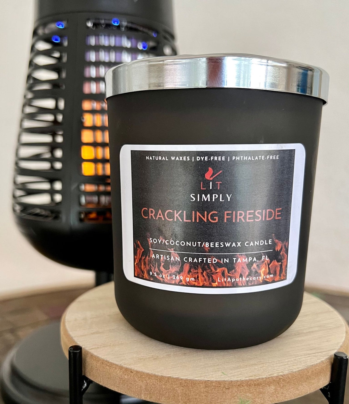 Crackling Fireside candle in decorative jar with wooden wick and cozy fall home fragrance styling.