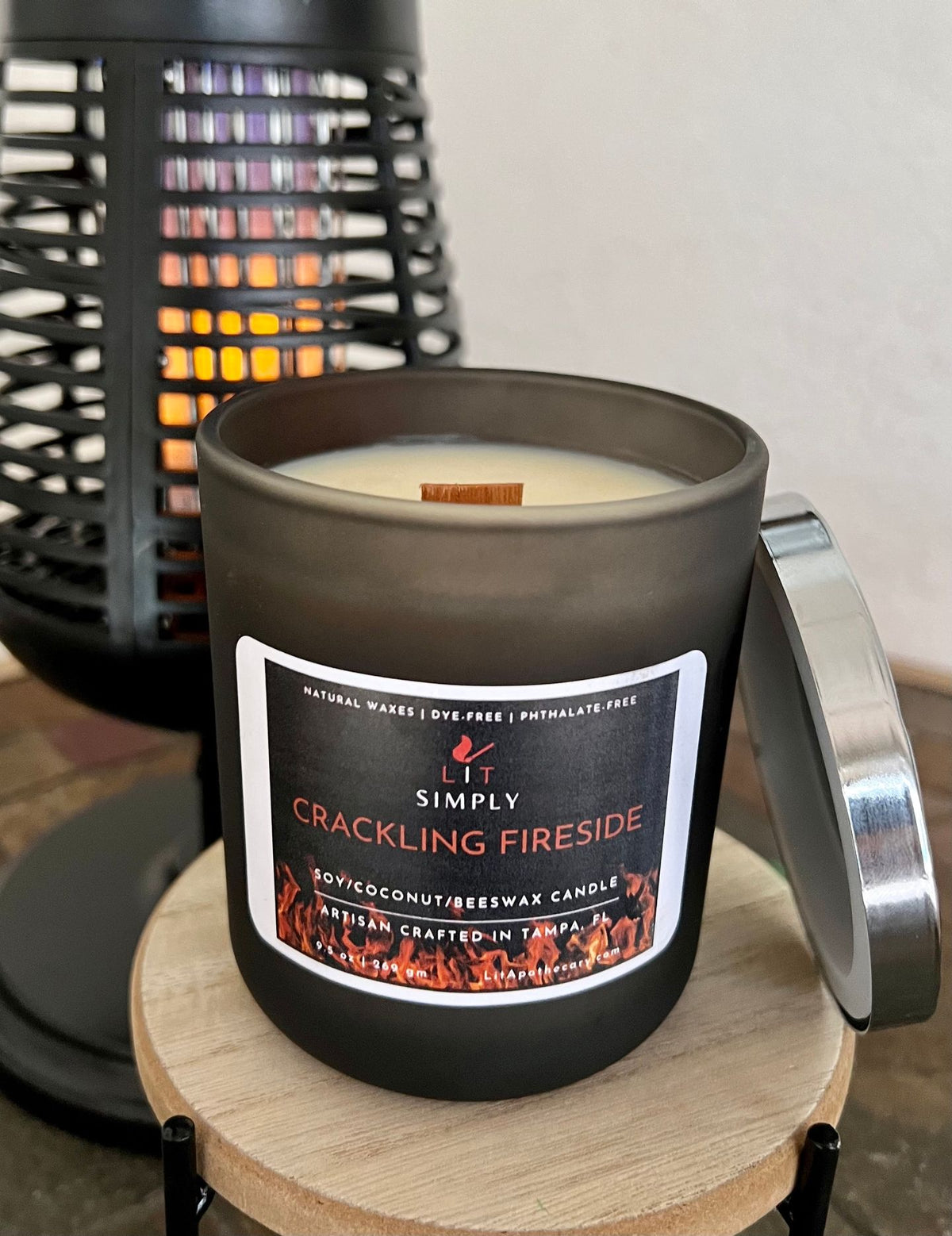 Open Crackling Fireside candle showing wooden wick and wax in a decorative jar.