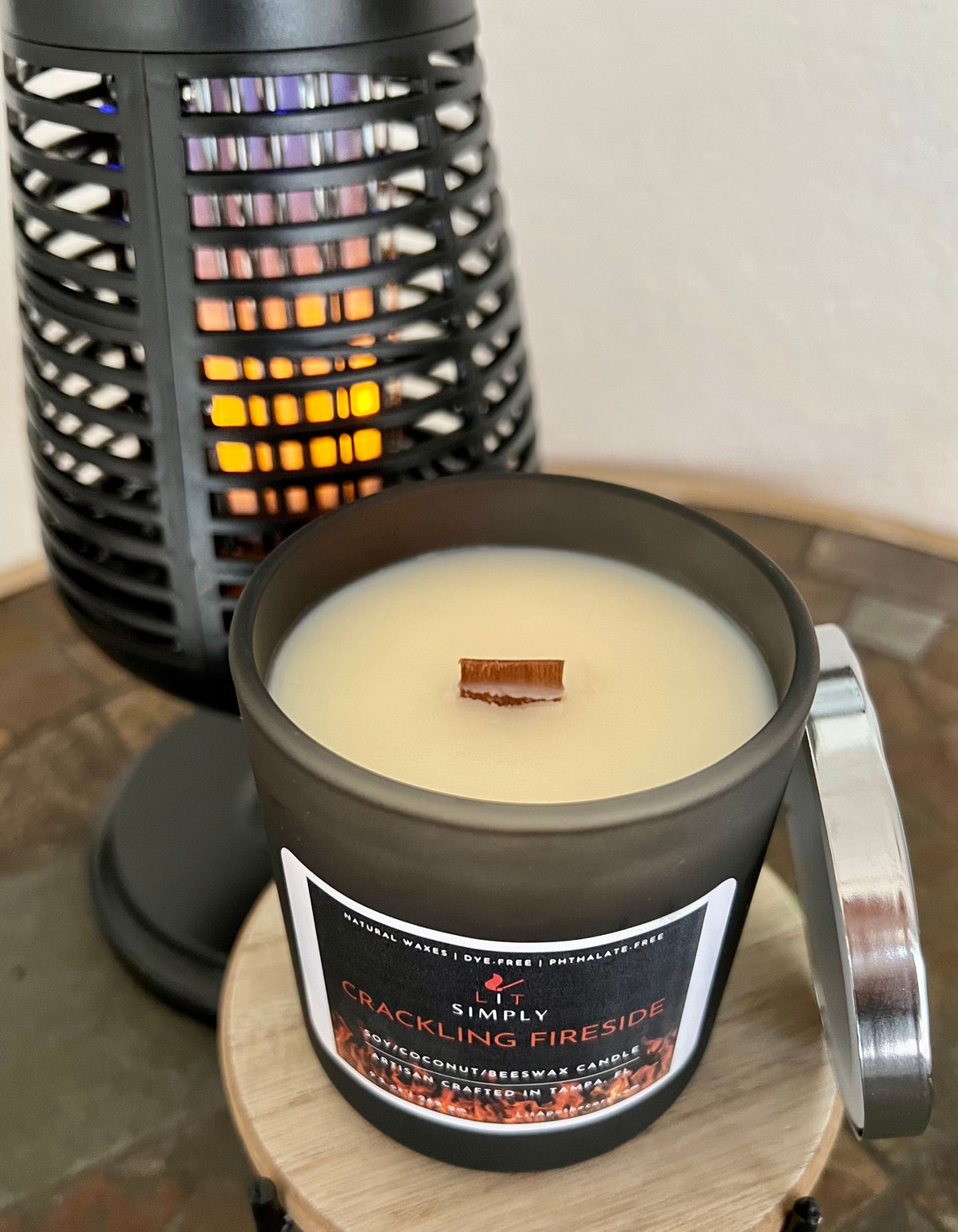 Top view of Crackling Fireside wooden wick candle in a decorative jar.