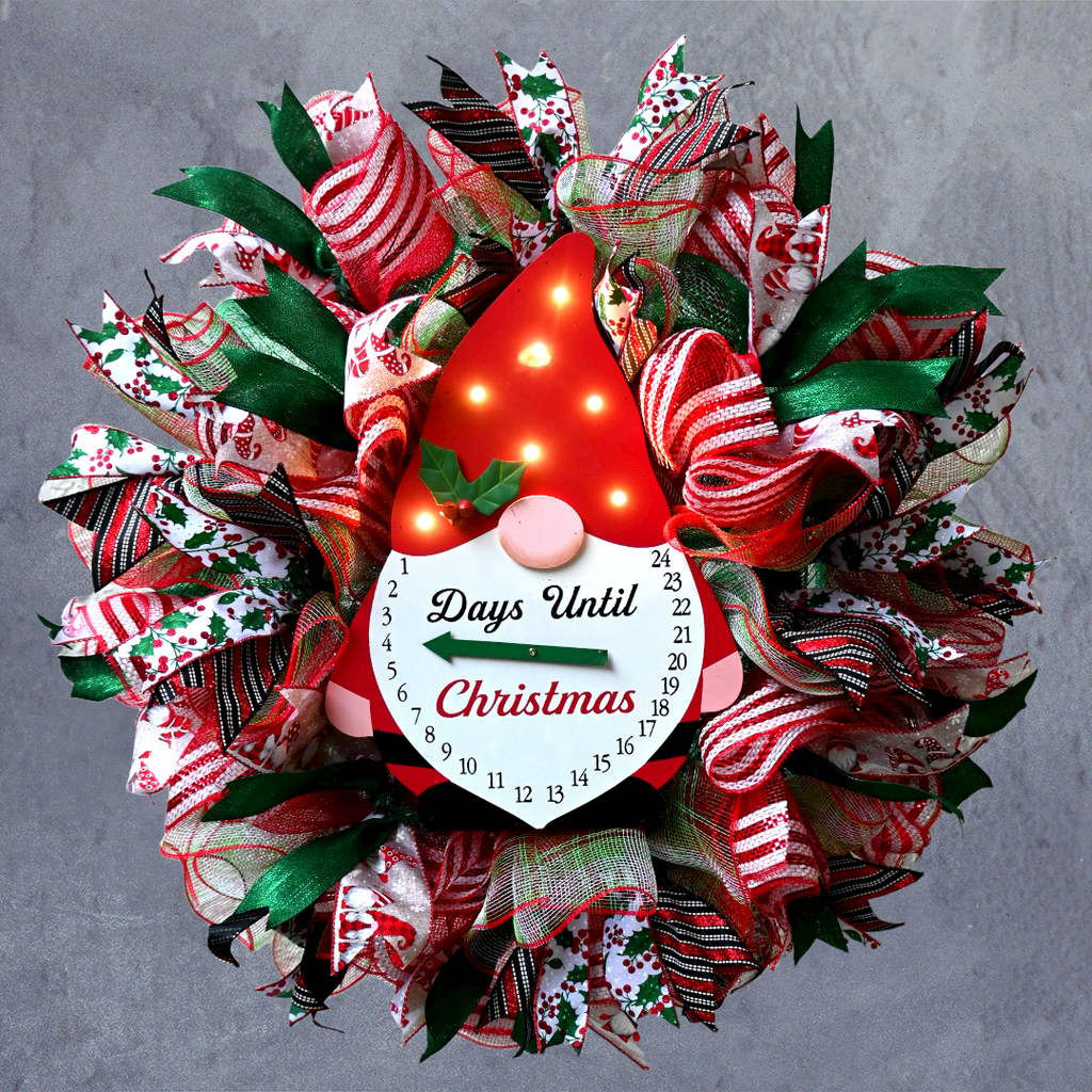 Full view of the Christmas gnome wreath with the gnome hat illuminated