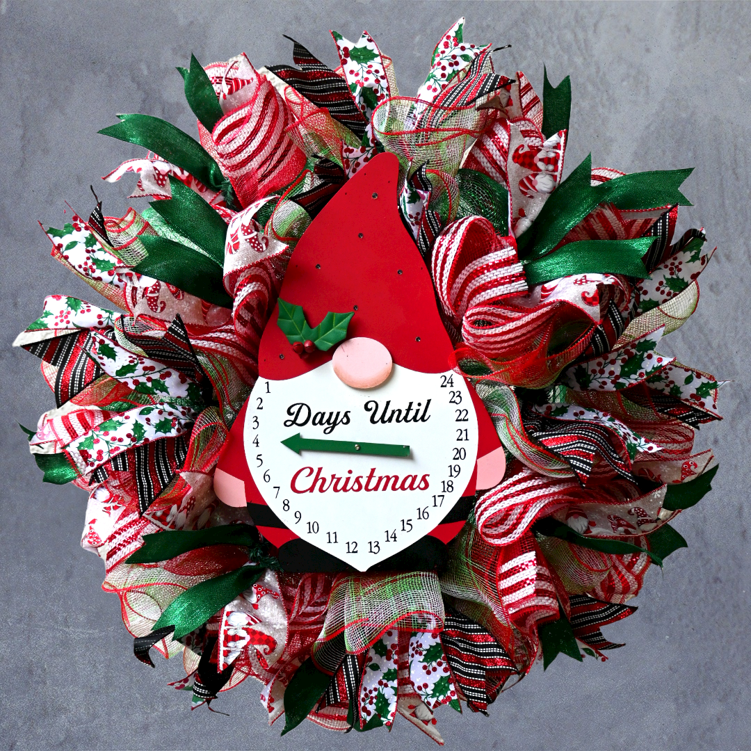 Lighted gnome Christmas countdown wreath with red, lime green and white holiday ribbons