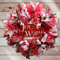 Joy to the World Christmas wreath with cardinal sign, red and white ribbons, buffalo check, plaid, and festive holiday accents.