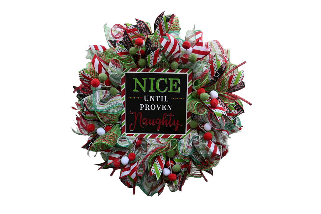 Full view of the 24-inch Naughty Nice Christmas wreath with colorful ribbon bows