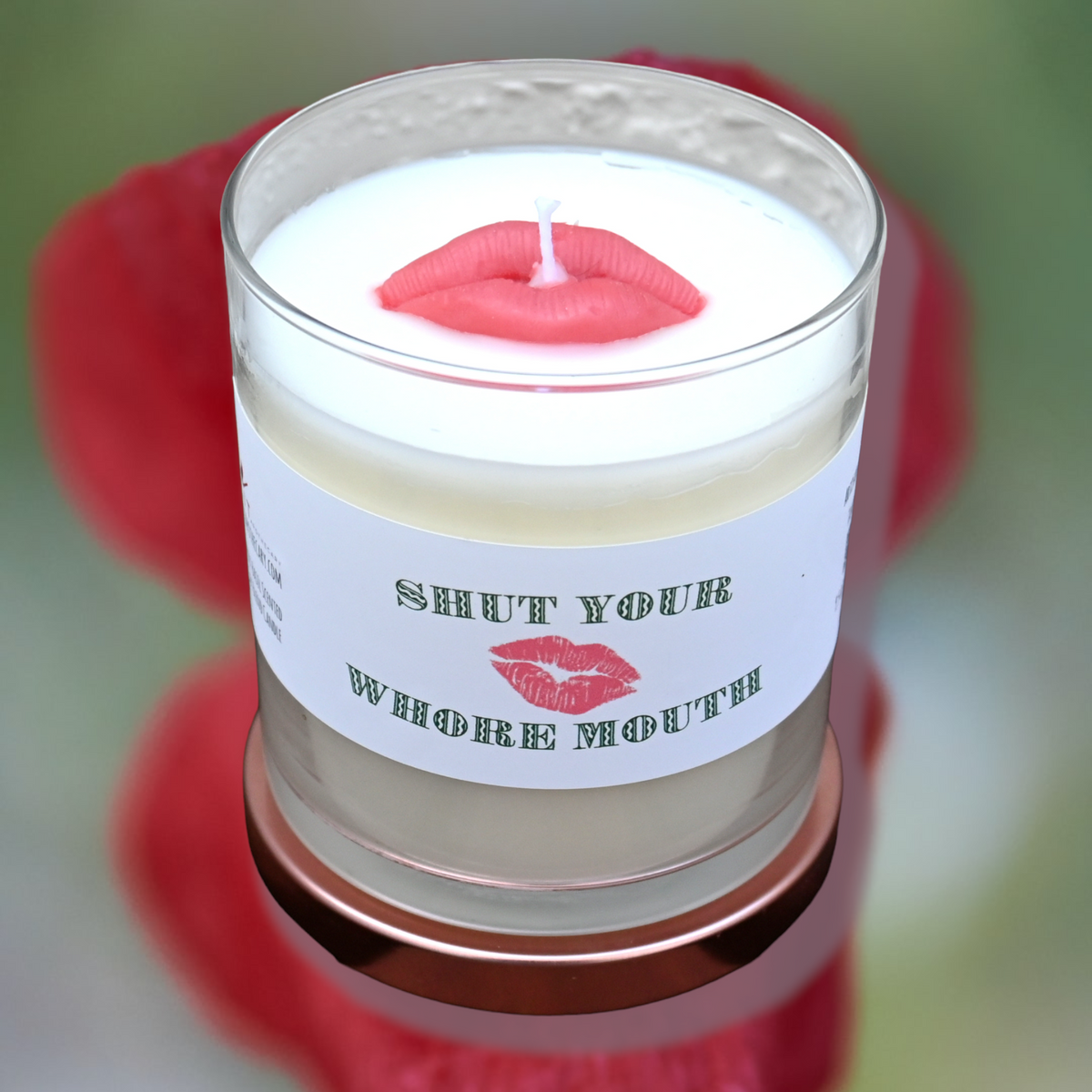 Open Shut Your Whore Mouth mint and basil candle with red lips wax accent, clear jar and bold label